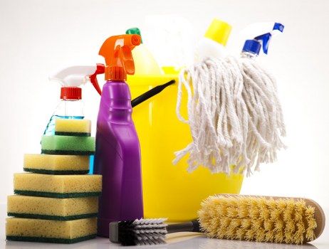Professional deep cleaning service in a bathroom with attention to fixtures